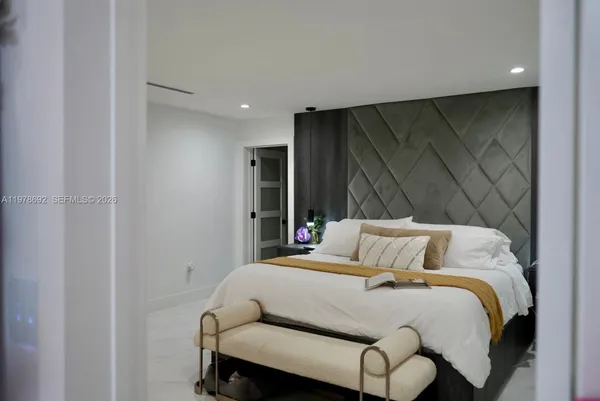 a view of a backyard with table and chairs