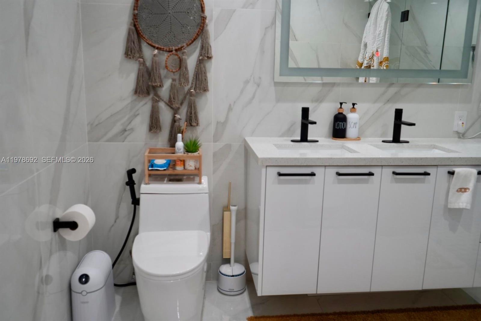 9351 Southwest 88th Terrace Miami, FL 33176 - Photo 53 of 73 a bathroom with a sink and toilet