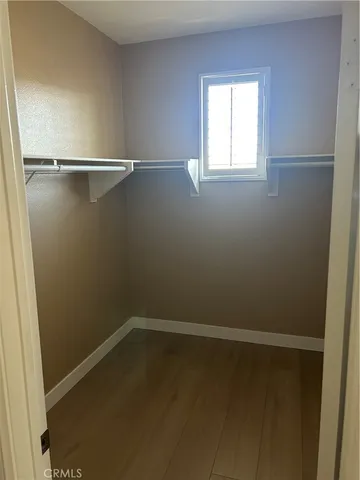 a view of a room with racks on the wall