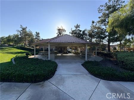 3366 Greenpark Lane Riverside, CA 92503 - Photo 19 of 23 a view of a house with garden and a swimming pool
