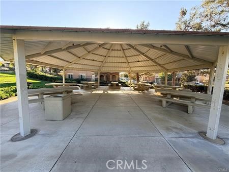 3366 Greenpark Lane Riverside, CA 92503 - Photo 23 of 23 a view of a patio with table and chairs