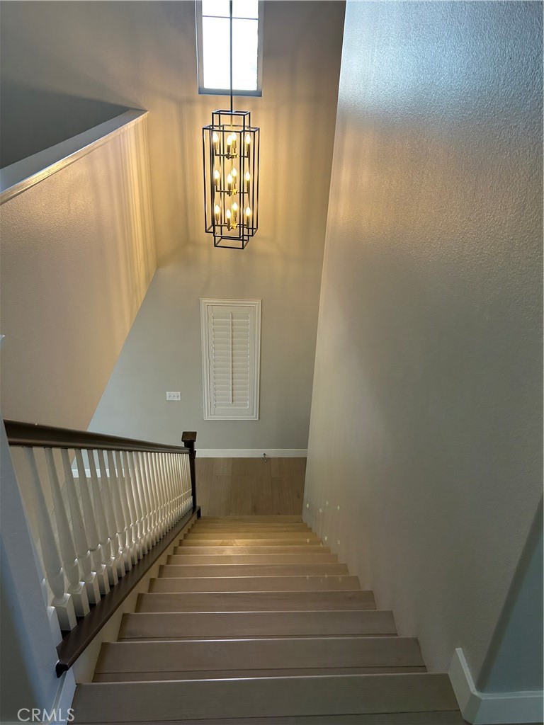 3366 Greenpark Lane Riverside, CA 92503 - Photo 9 of 23 a view of entryway with stairs and wooden floor
