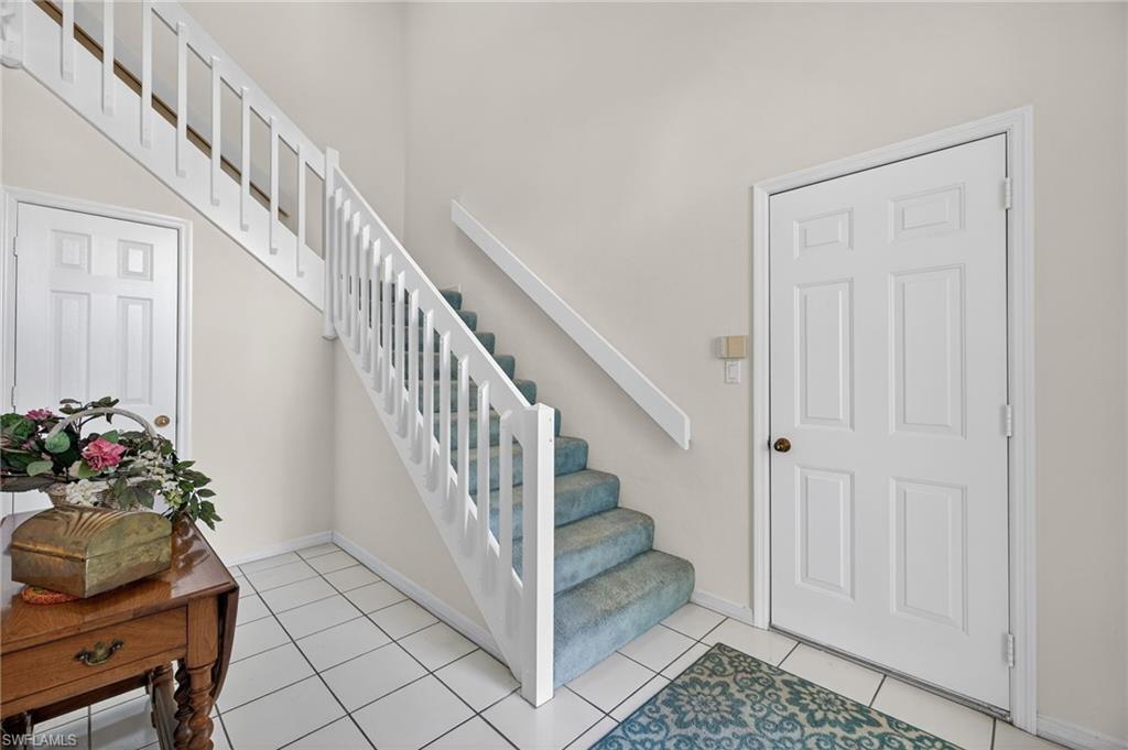 242 Via Perignon, Unit 93 Naples, FL 34119 - Photo 5 of 20 a view of entryway with wooden floor