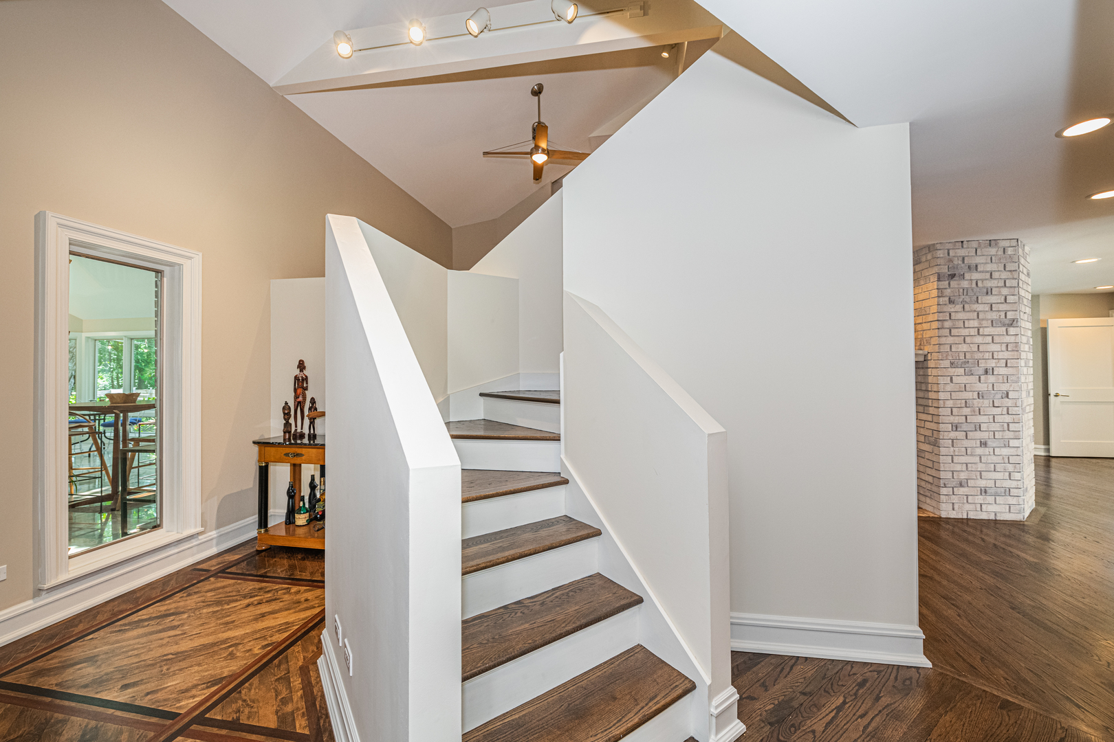 27149 West Cuba Road Barrington, IL 60010 - Photo 25 of 68 a view of entryway with wooden floor and stairs