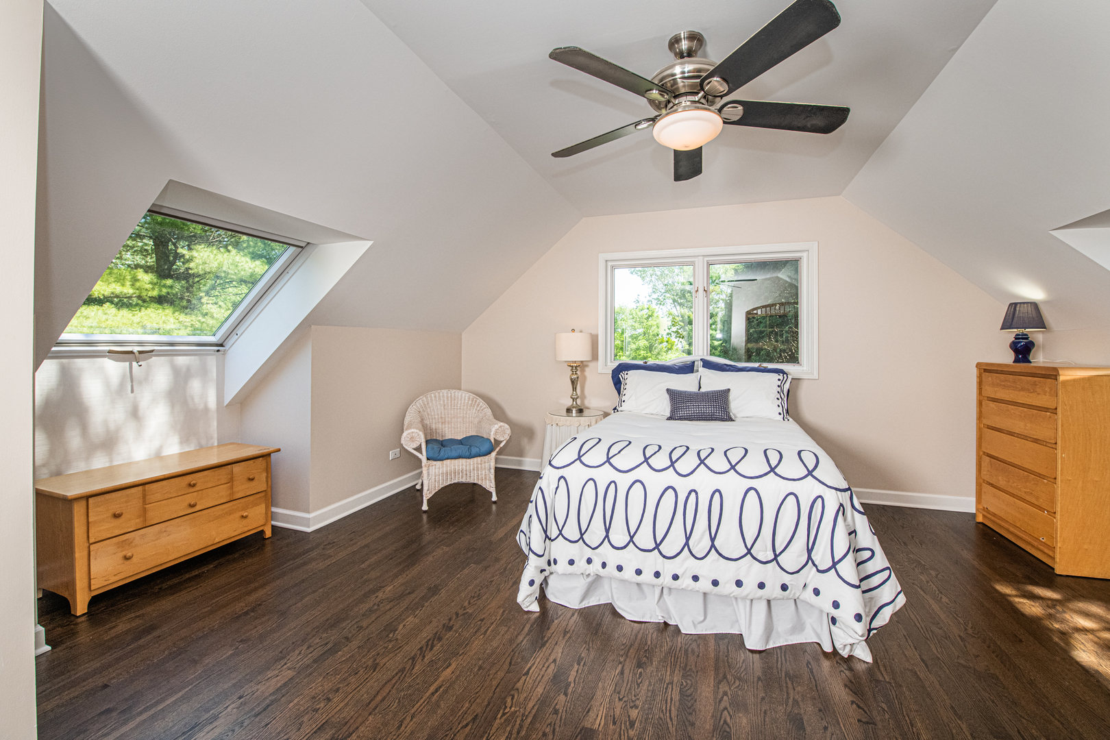 27149 West Cuba Road Barrington, IL 60010 - Photo 28 of 68 a bedroom with a bed and a dresser with wooden floor