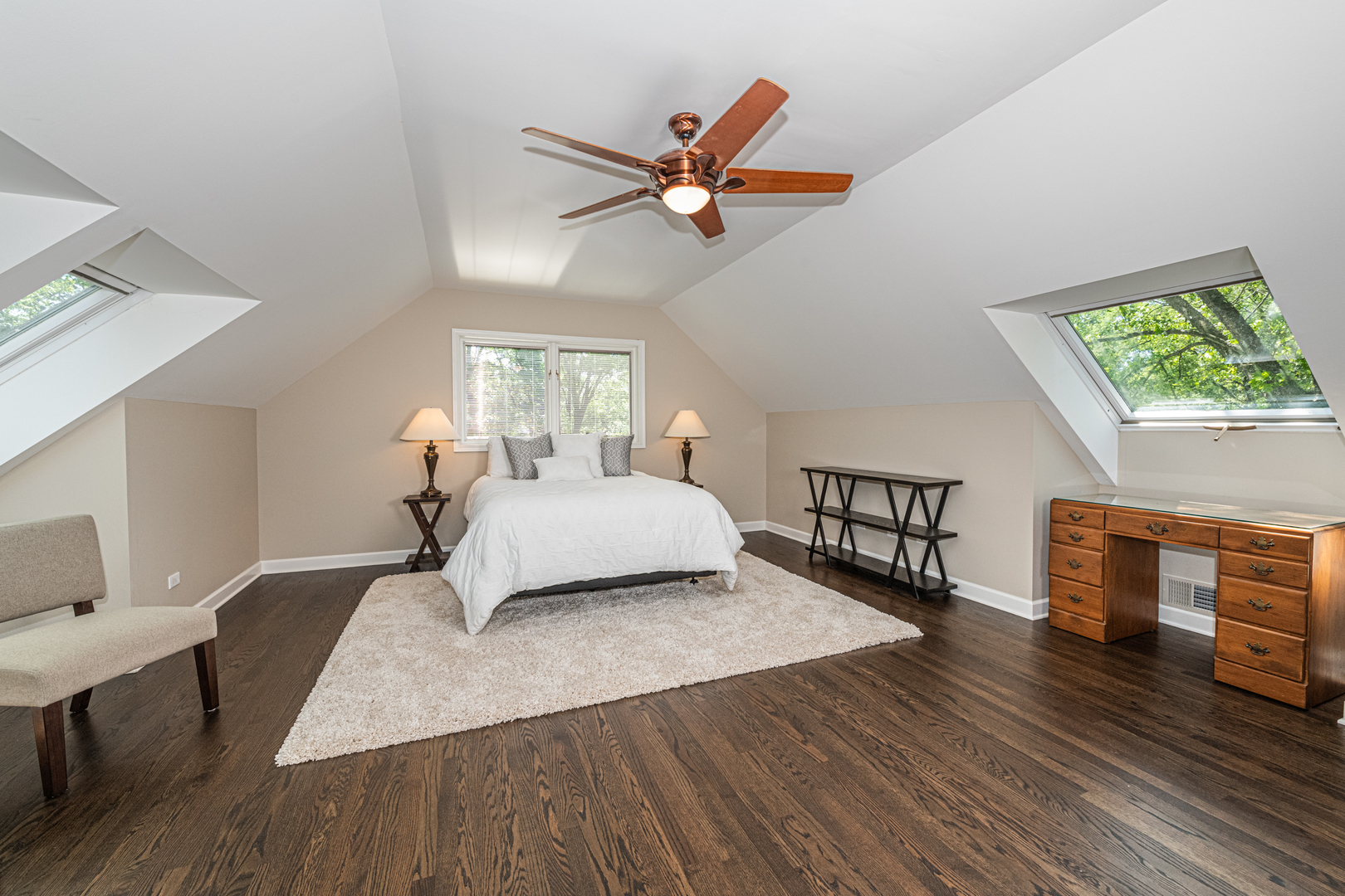 27149 West Cuba Road Barrington, IL 60010 - Photo 34 of 68 a bedroom with a bed and dresser with wooden floor