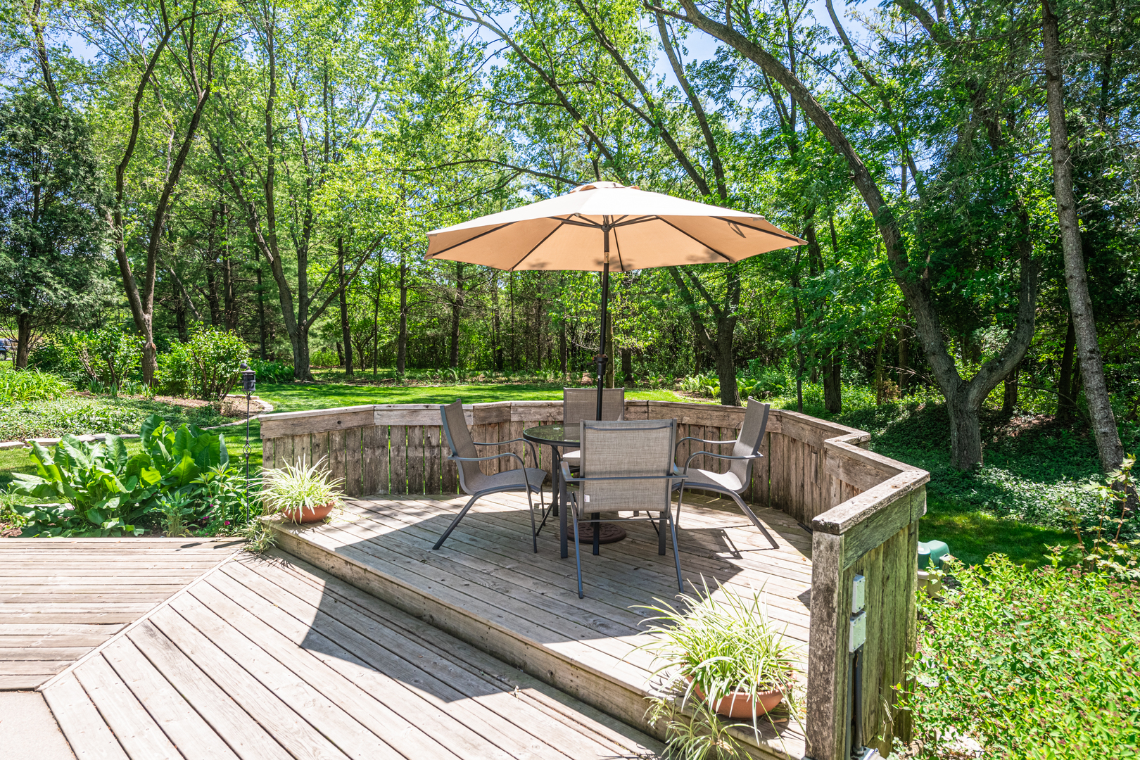 27149 West Cuba Road Barrington, IL 60010 - Photo 49 of 68 a view of swimming pool with table and chairs under an umbrella