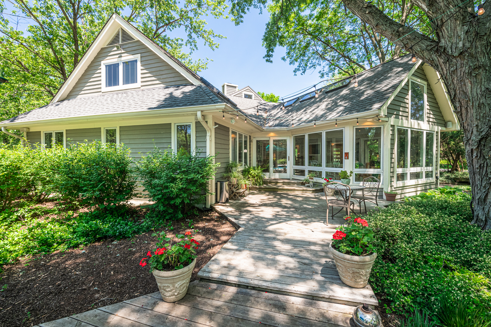 27149 West Cuba Road Barrington, IL 60010 - Photo 50 of 68 a front view of a house with a garden