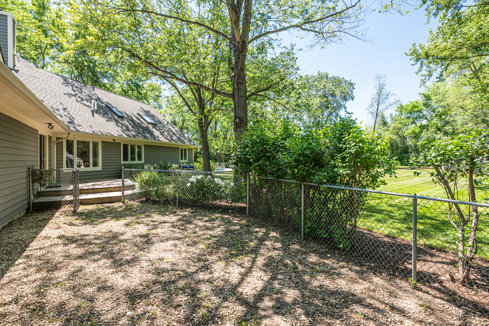 27149 West Cuba Road Barrington, IL 60010 - Photo 57 of 68 a backyard of a house with lots of green space