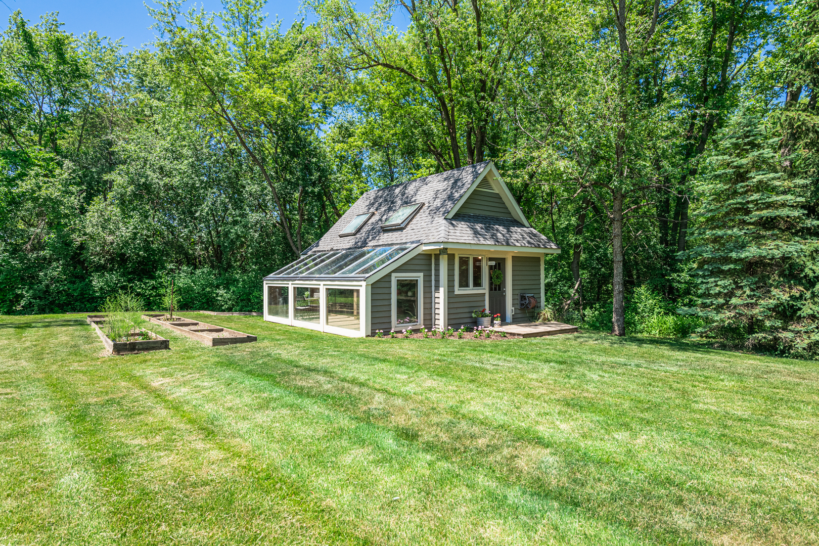 27149 West Cuba Road Barrington, IL 60010 - Photo 59 of 68 a front view of a house with a garden