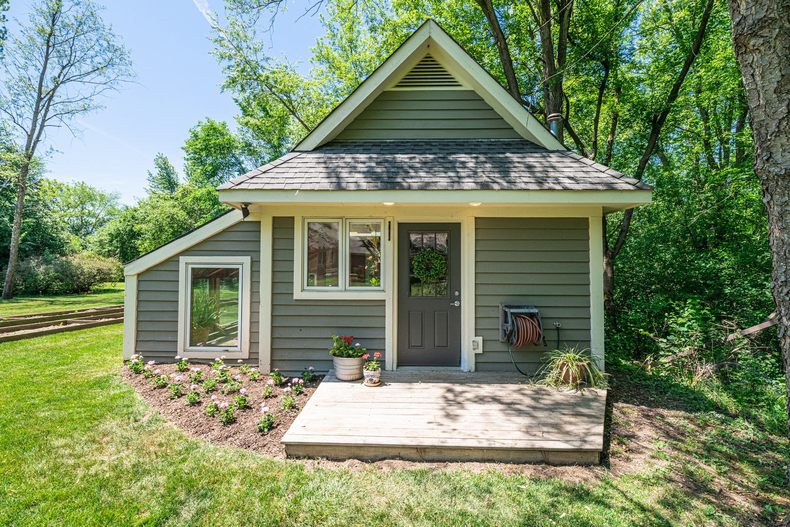 27149 West Cuba Road Barrington, IL 60010 - Photo 60 of 68 a front view of a house with garden