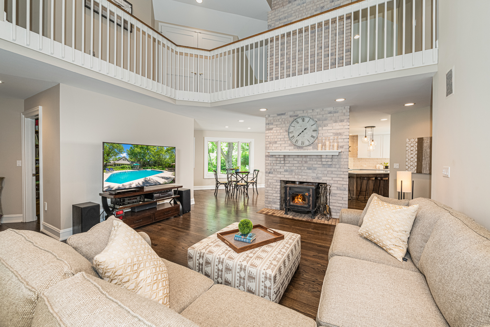 27149 West Cuba Road Barrington, IL 60010 - Photo 10 of 68 a living room with furniture a fireplace and a flat screen tv