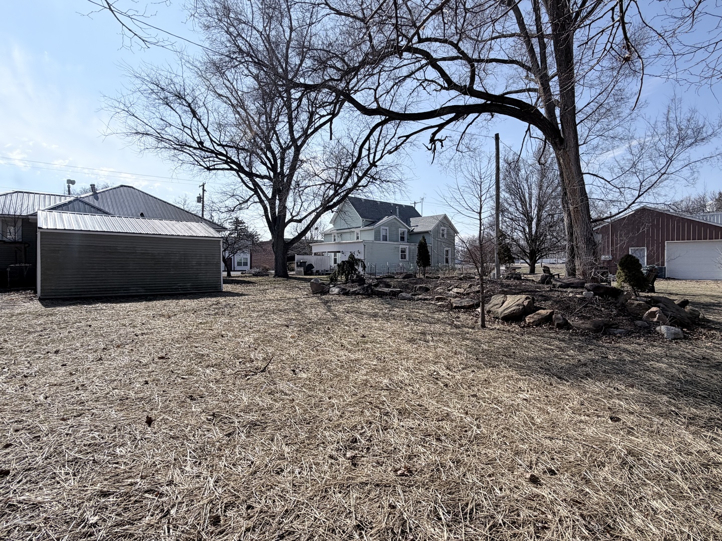 102 East Lincoln Street Pesotum, IL 61863 - Photo 4 of 24 a front view of a house with a yard