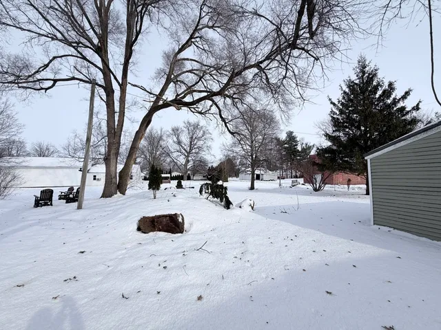 a view of the road with trees