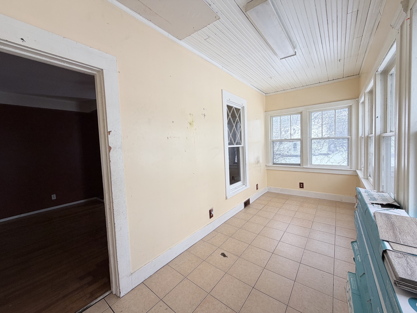 102 East Lincoln Street Pesotum, IL 61863 - Photo 6 of 24 a view of an empty room with a window