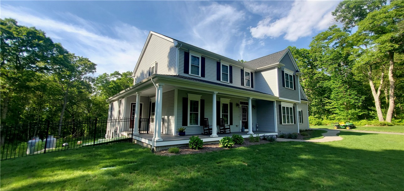 76 Kayla Ricci Way Exeter, RI 02874 - Photo 47 of 49 View of side porch entry with movable dog ramp