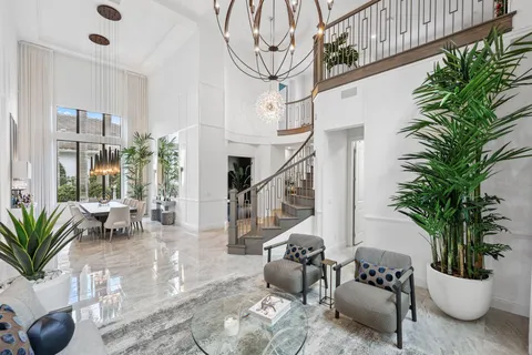a kitchen with granite countertop cabinets and steel stainless steel appliances