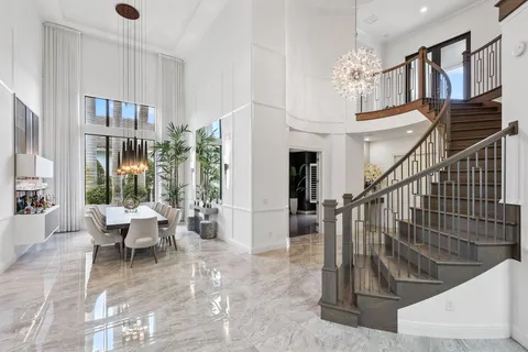 a kitchen with stainless steel appliances granite countertop a stove and a sink