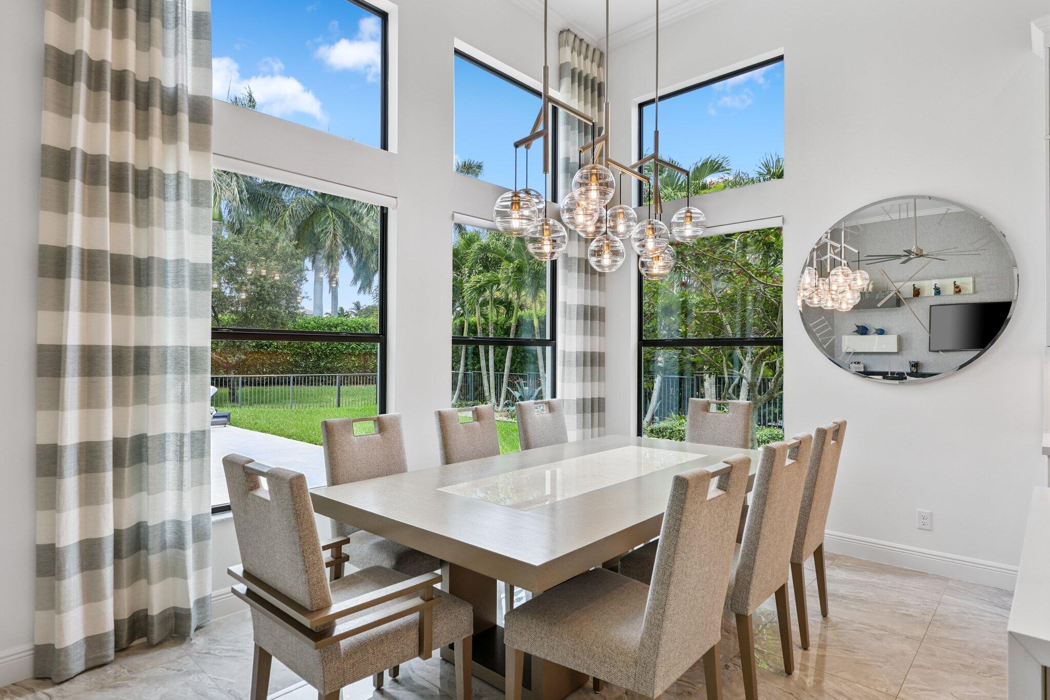 2741 Northwest 70th Boulevard Boca Raton, FL 33496 - Photo 33 of 109 a view of a dining room with furniture window and outside view