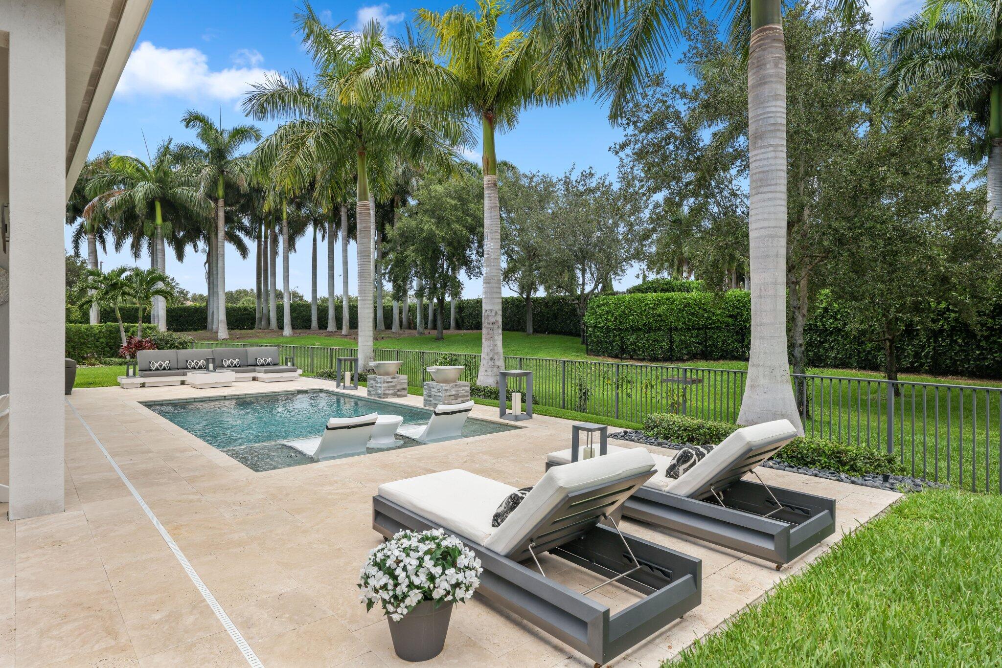2741 Northwest 70th Boulevard Boca Raton, FL 33496 - Photo 40 of 109 a view of a patio with a backyard
