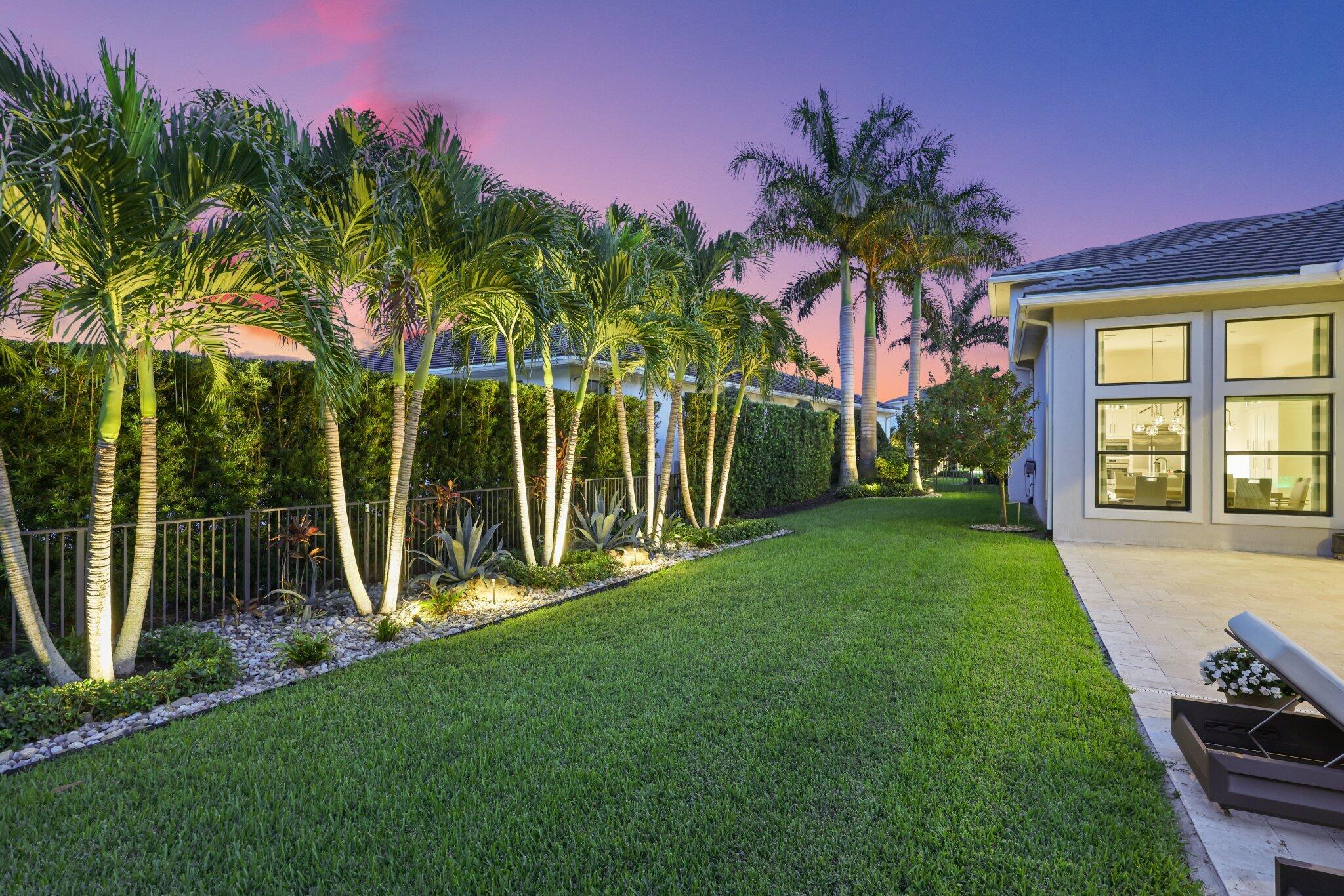 2741 Northwest 70th Boulevard Boca Raton, FL 33496 - Photo 45 of 109 a view of a backyard with a garden and entertaining space