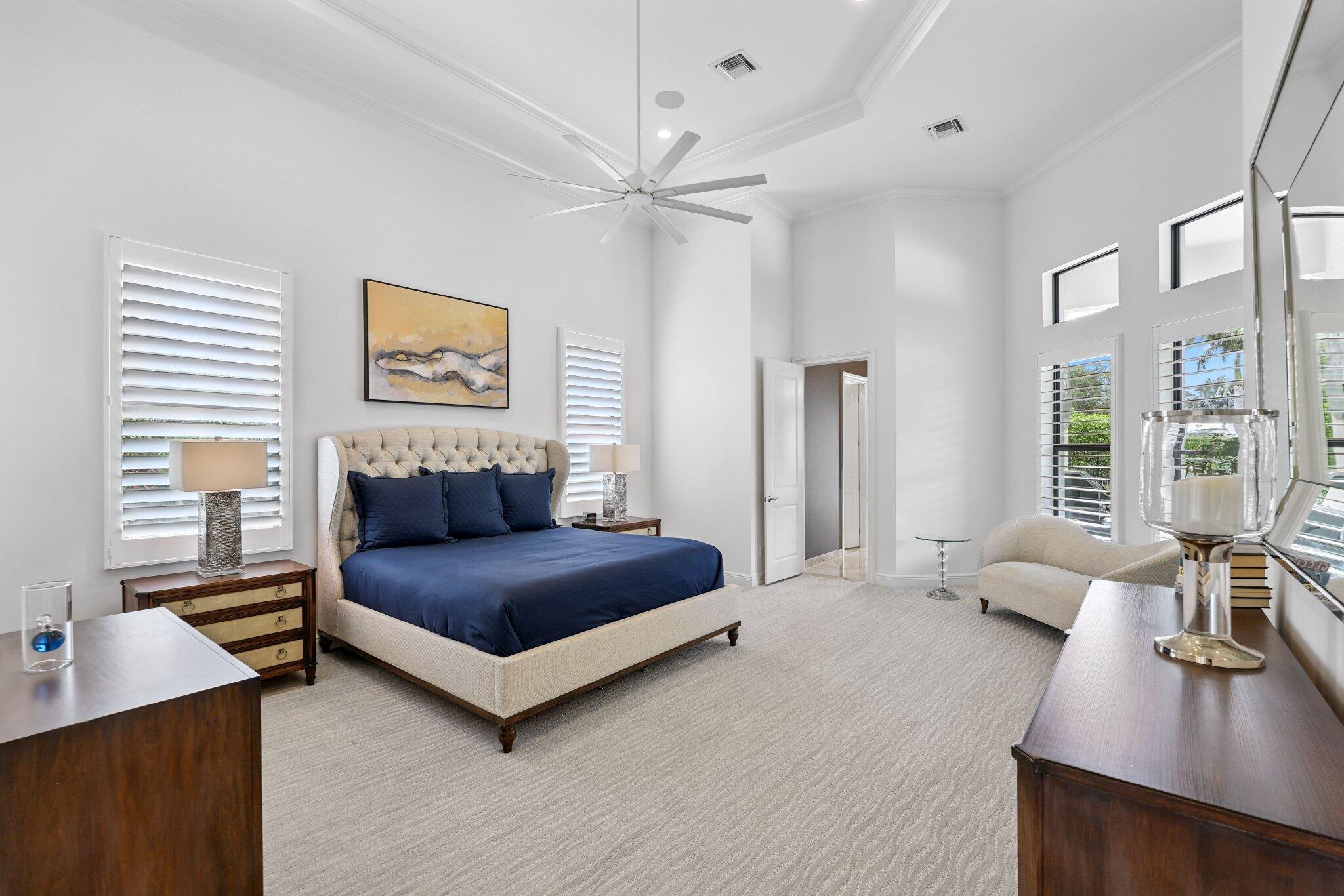 2741 Northwest 70th Boulevard Boca Raton, FL 33496 - Photo 55 of 109 a living room with furniture and a large window