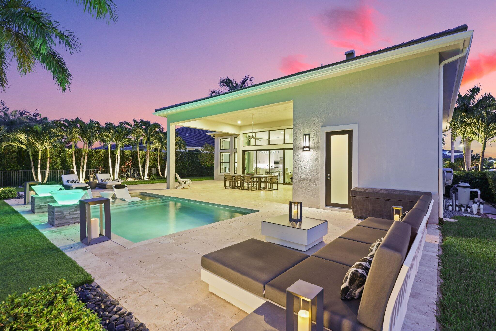 2741 Northwest 70th Boulevard Boca Raton, FL 33496 - Photo 100 of 109 a view of a patio with swimming pool table and chairs