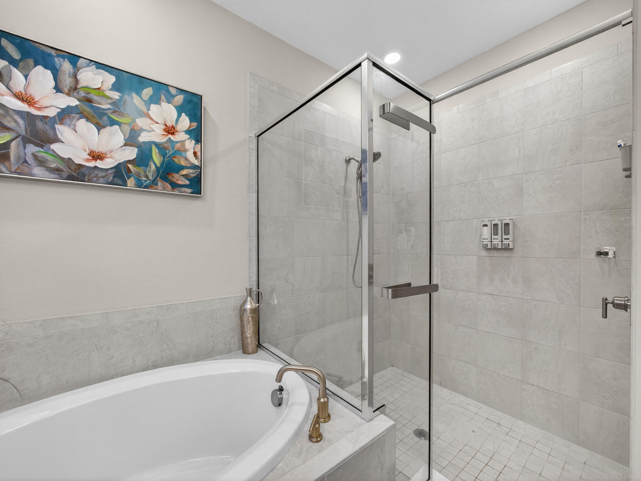 11912 Southwest Macelli Way Port Port St. Lucie, FL 34987 - Photo 12 of 34 a bathroom with a bathtub and a shower