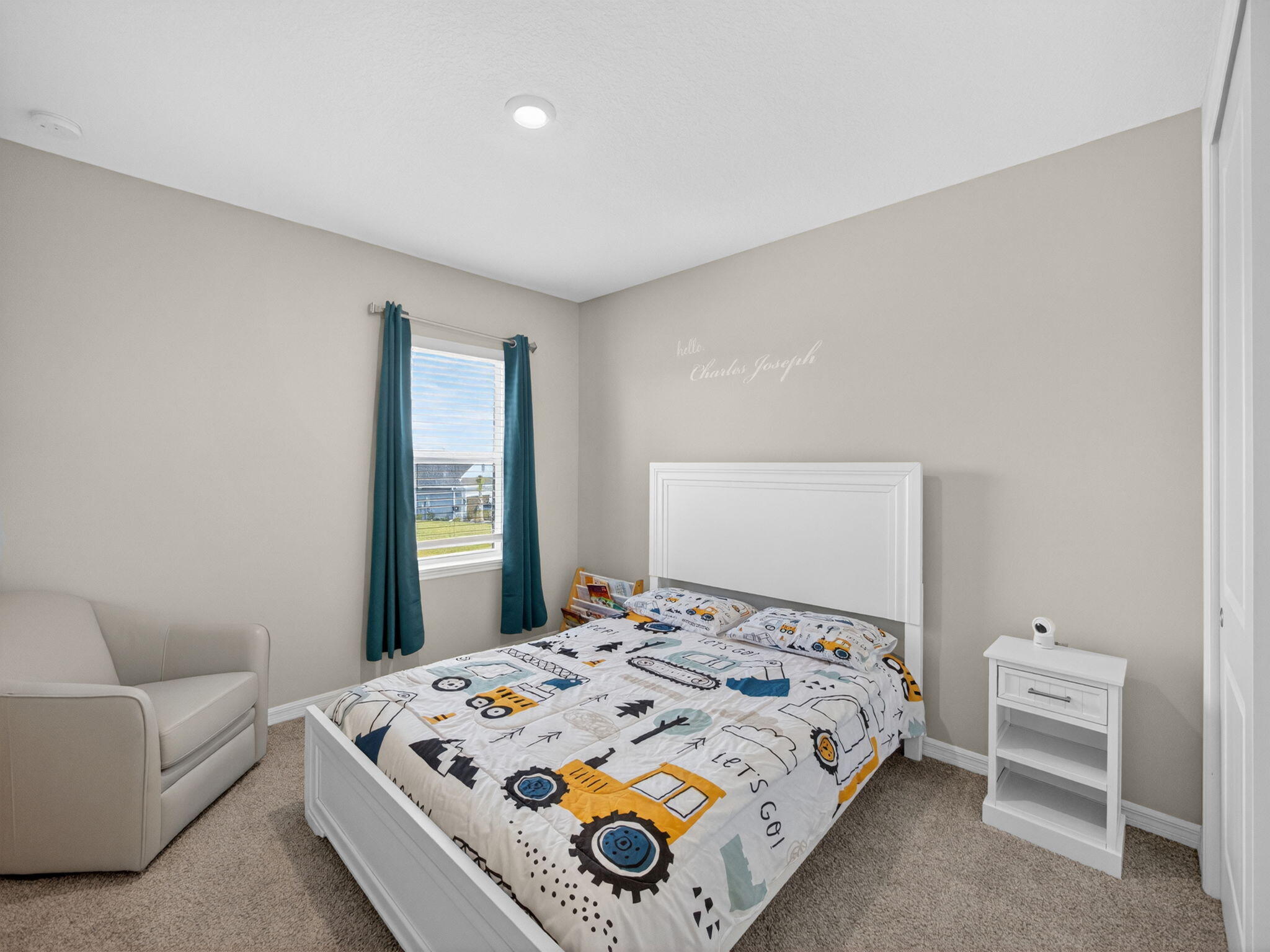 11912 Southwest Macelli Way Port Port St. Lucie, FL 34987 - Photo 20 of 34 a bedroom with a bed and a couch