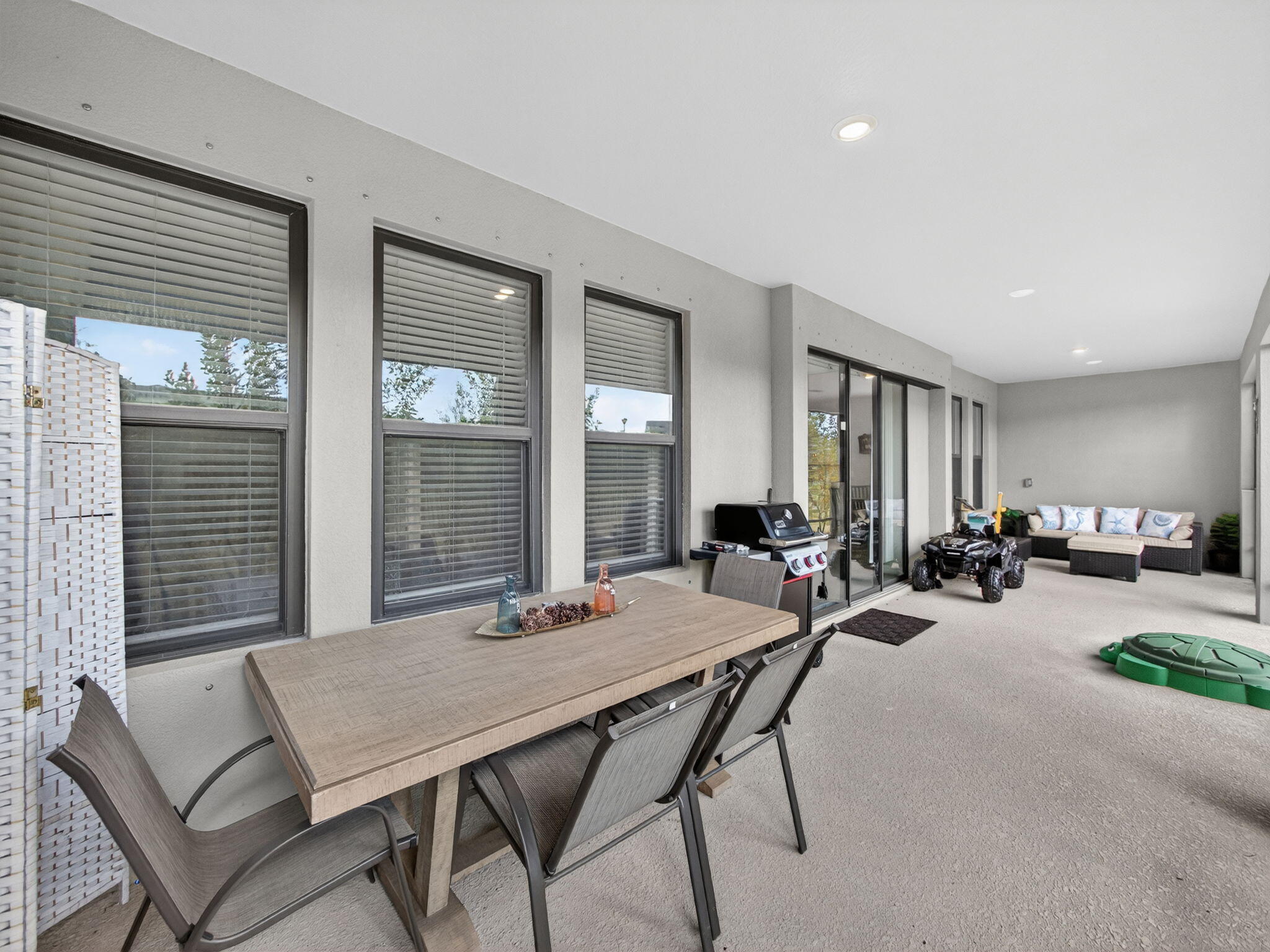 11912 Southwest Macelli Way Port Port St. Lucie, FL 34987 - Photo 26 of 34 a view of a livingroom with furniture and window