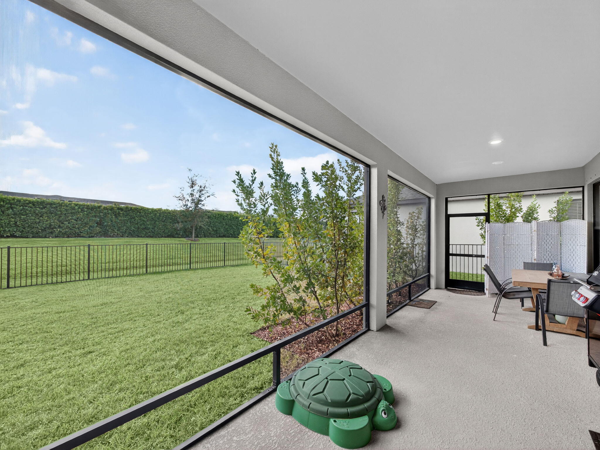 11912 Southwest Macelli Way Port Port St. Lucie, FL 34987 - Photo 28 of 34 a view of a garden with an outdoor seating