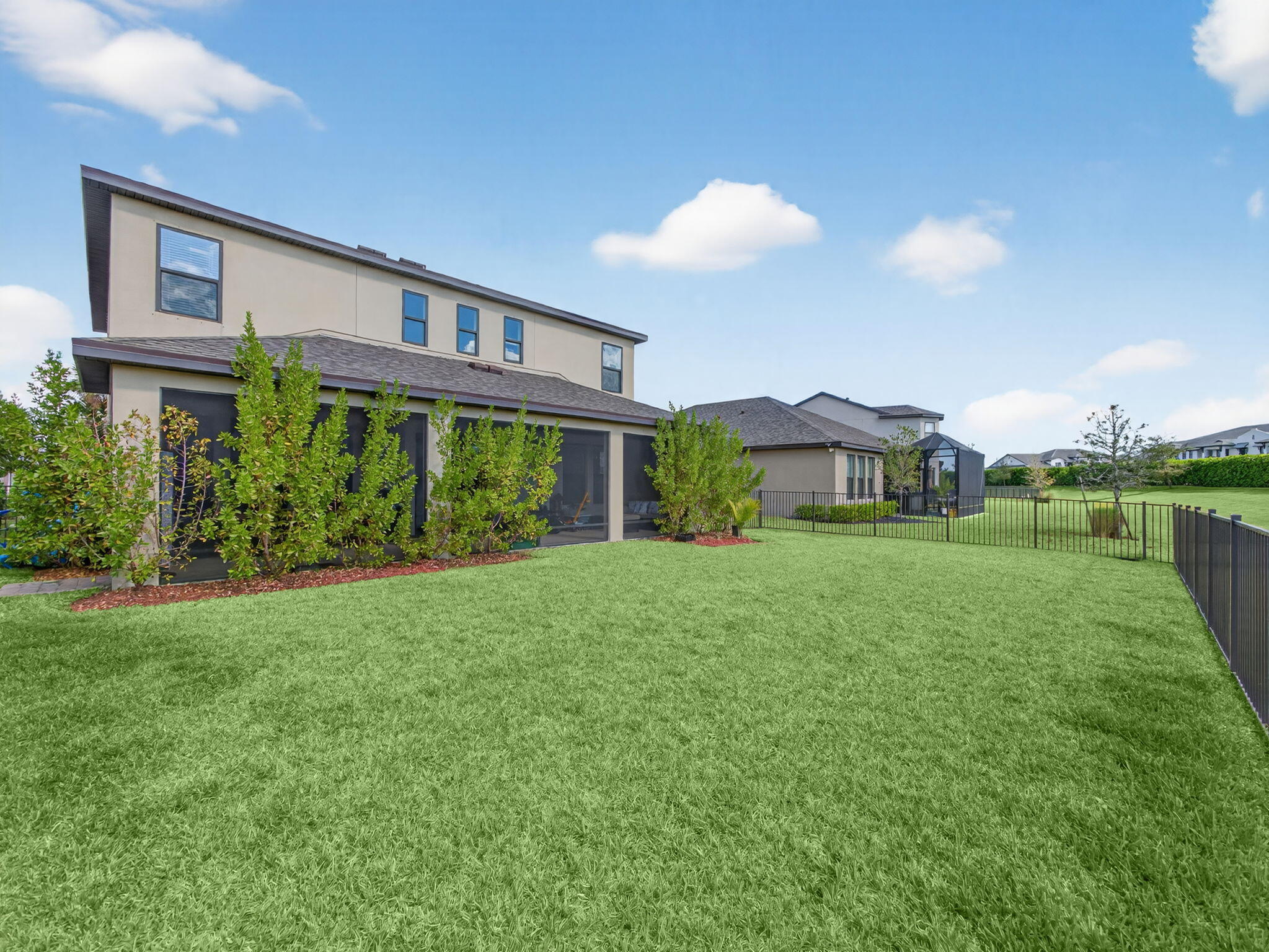 11912 Southwest Macelli Way Port Port St. Lucie, FL 34987 - Photo 30 of 34 a front view of a house with garden