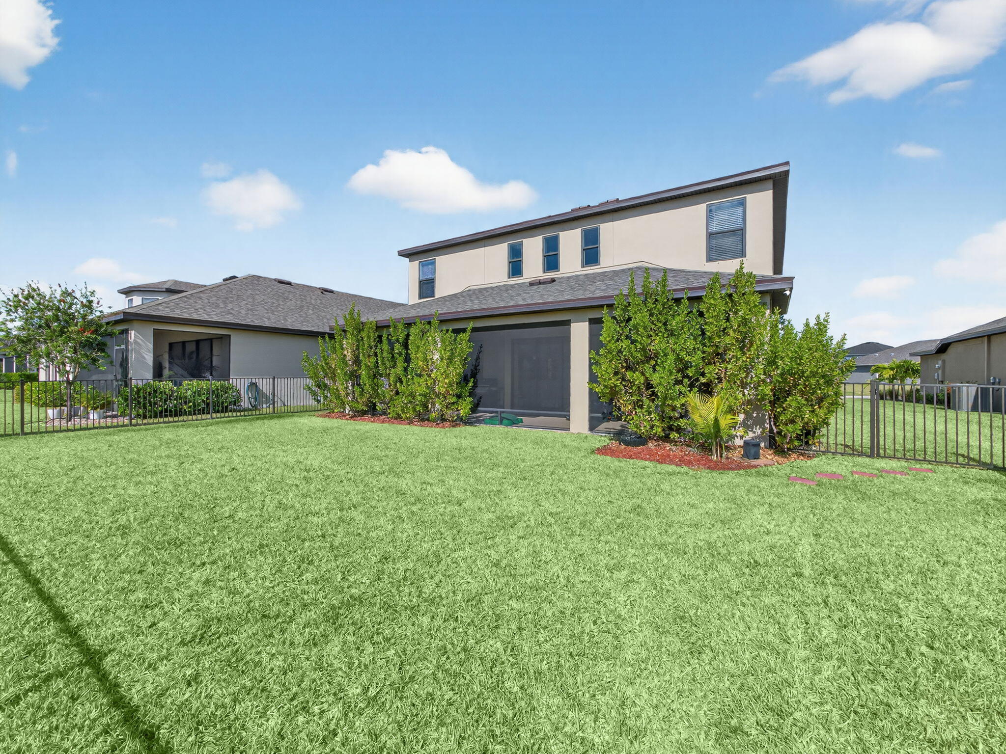 11912 Southwest Macelli Way Port Port St. Lucie, FL 34987 - Photo 31 of 34 front view of a house with a yard