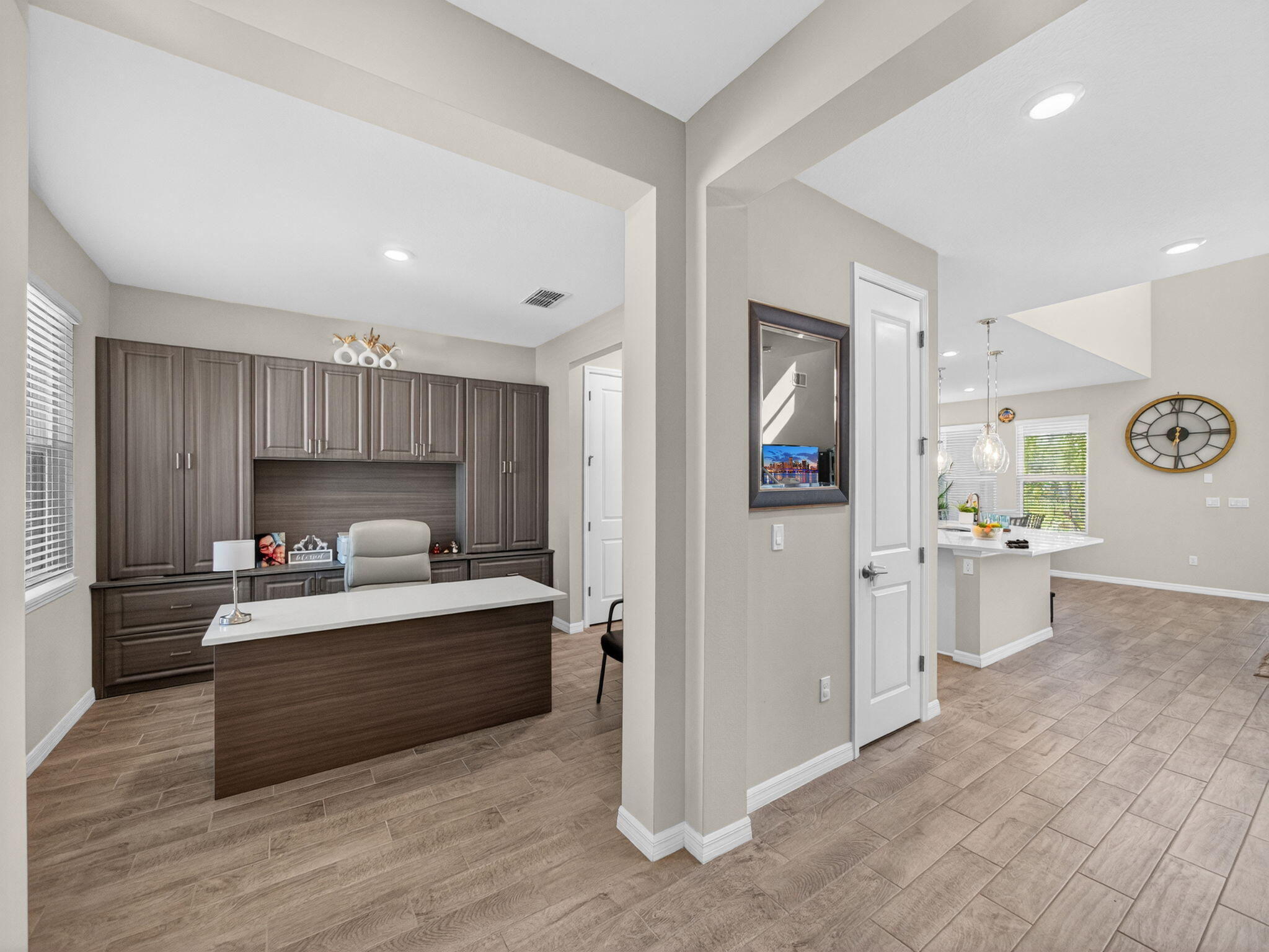 11912 Southwest Macelli Way Port Port St. Lucie, FL 34987 - Photo 4 of 34 a living room with furniture and a wooden floor