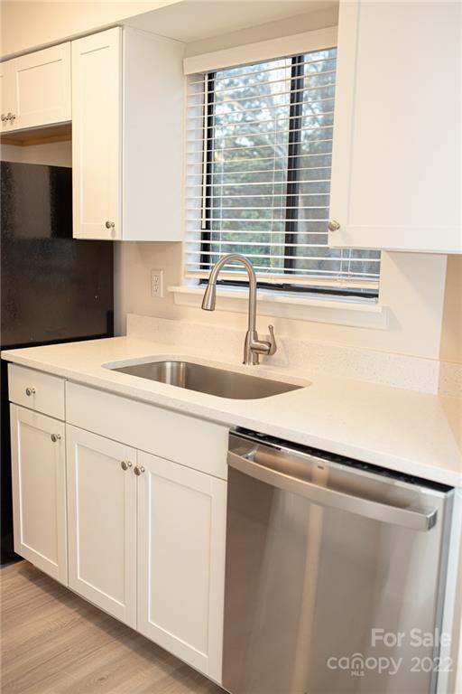 11039 Cedar View Road Charlotte, NC 28226 - Photo 10 of 24 a kitchen with a sink and a window