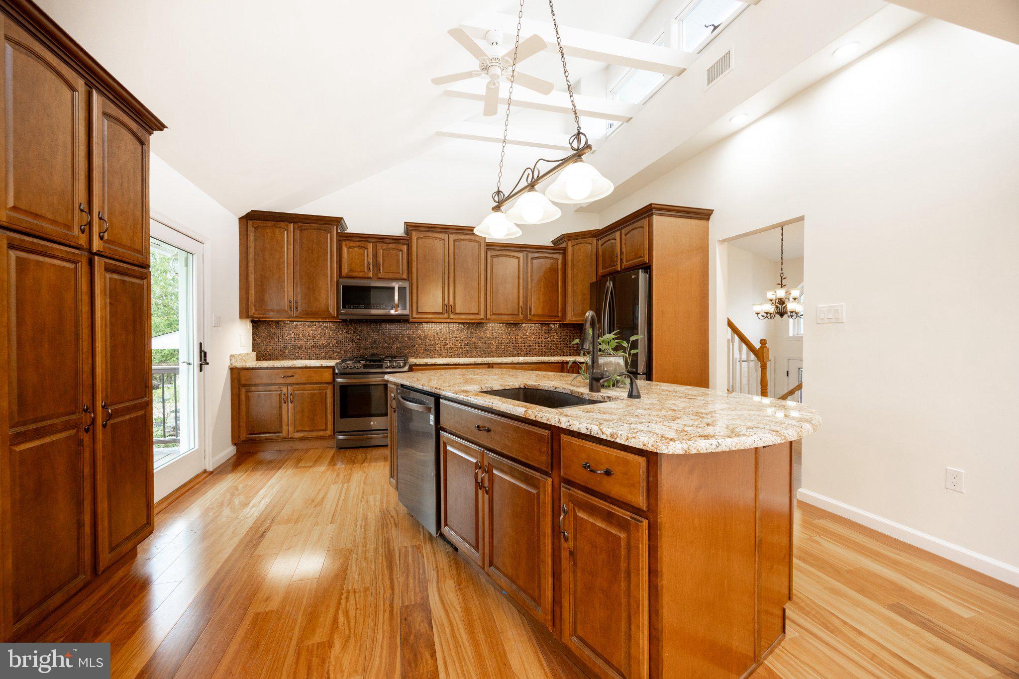 1241 Sheep Hill Road Pottstown, PA 19465 - Photo 4 of 55 Warm wood tones in a spacious kitchen.