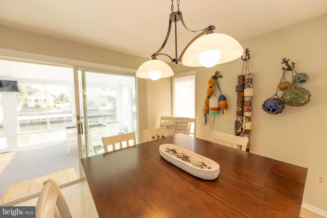 a kitchen with stainless steel appliances granite countertop a refrigerator sink and stove
