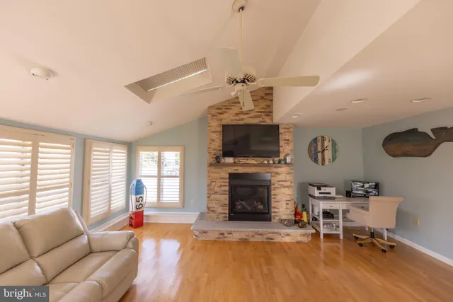 a bedroom with double bed and a window