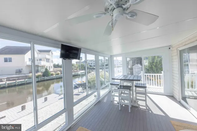 a spacious bathroom with a toilet sink and mirror