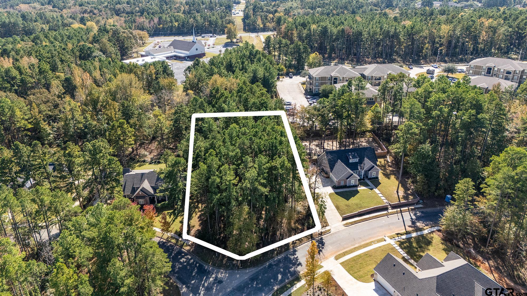 an aerial view of house with yard
