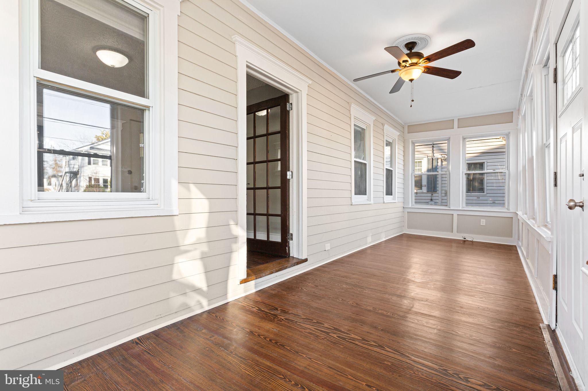 216 Richey Avenue Collingswood, NJ 08107 - Photo 2 of 39 wooden floor in an empty room with a window