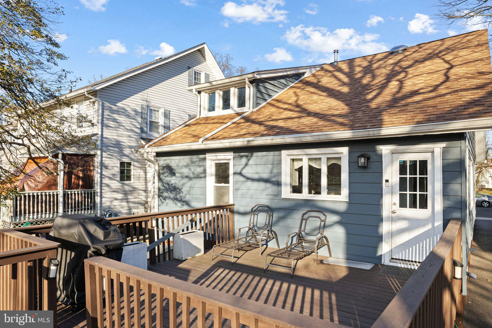 216 Richey Avenue Collingswood, NJ 08107 - Photo 29 of 39 a view of a house with wooden deck and furniture