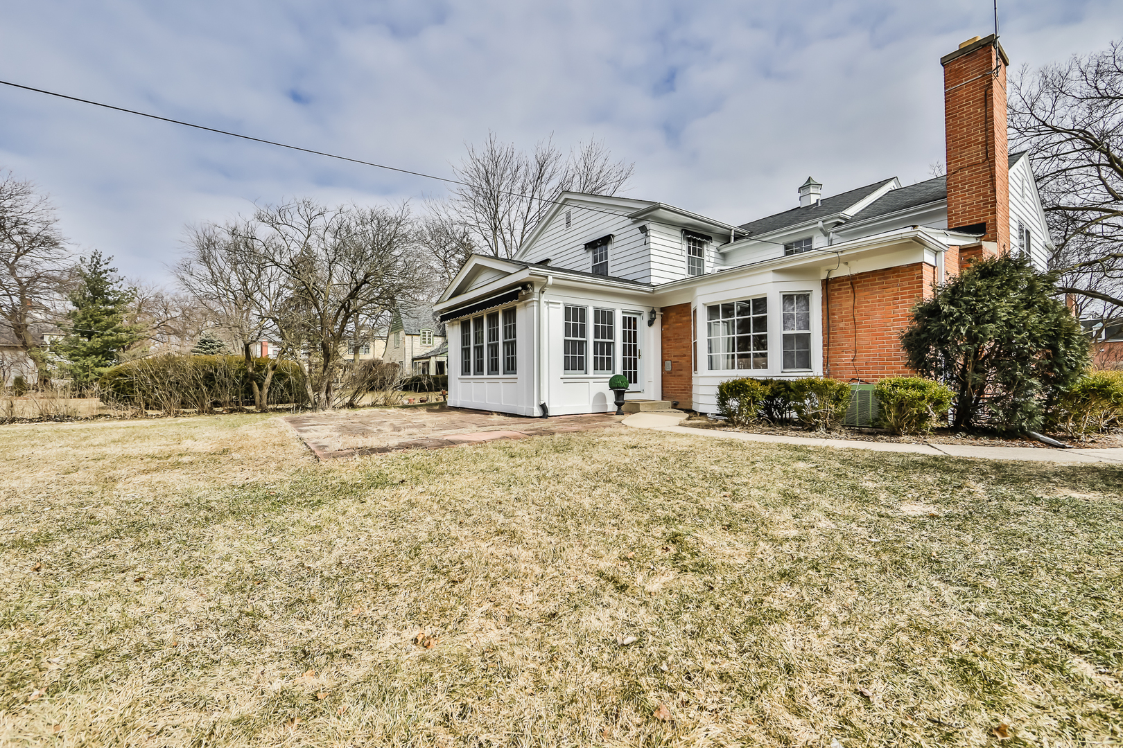 144 Michaux Road Riverside, IL 60546 - Photo 40 of 41 a front view of a house with a yard and trees