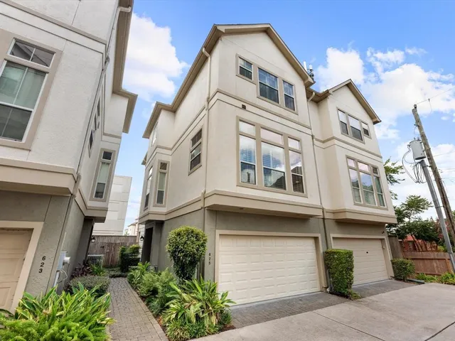 a front view of a multi story residential apartment building