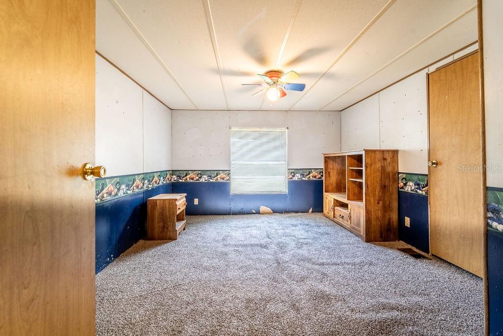 24031 Armadillo Road Astor, FL 32102 - Photo 25 of 43 a view of a storage & utility room