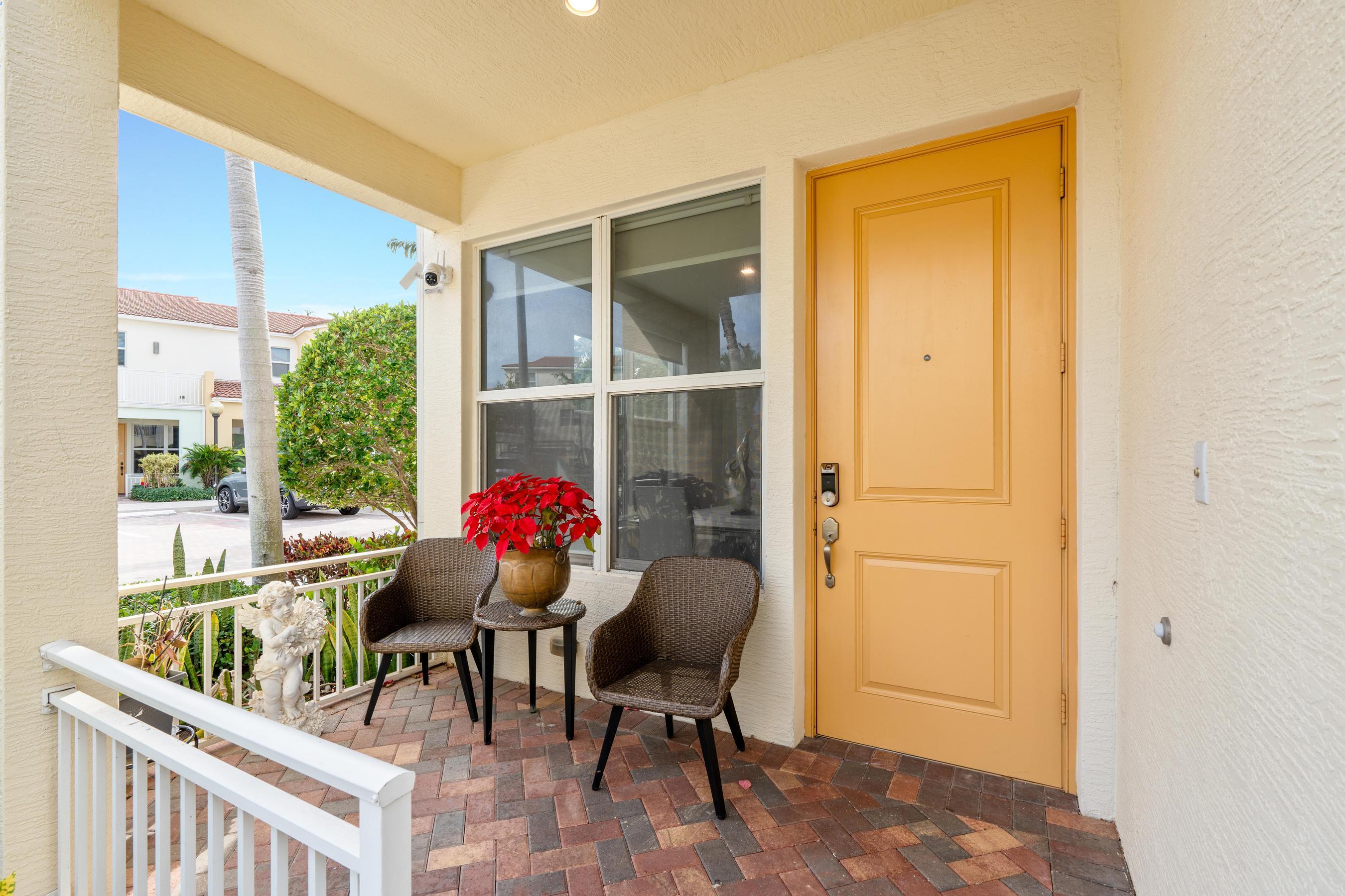 5010 Northwest 16th Way Boca Raton, FL 33431 - Photo 2 of 42 a outdoor living space with furniture and potted plants