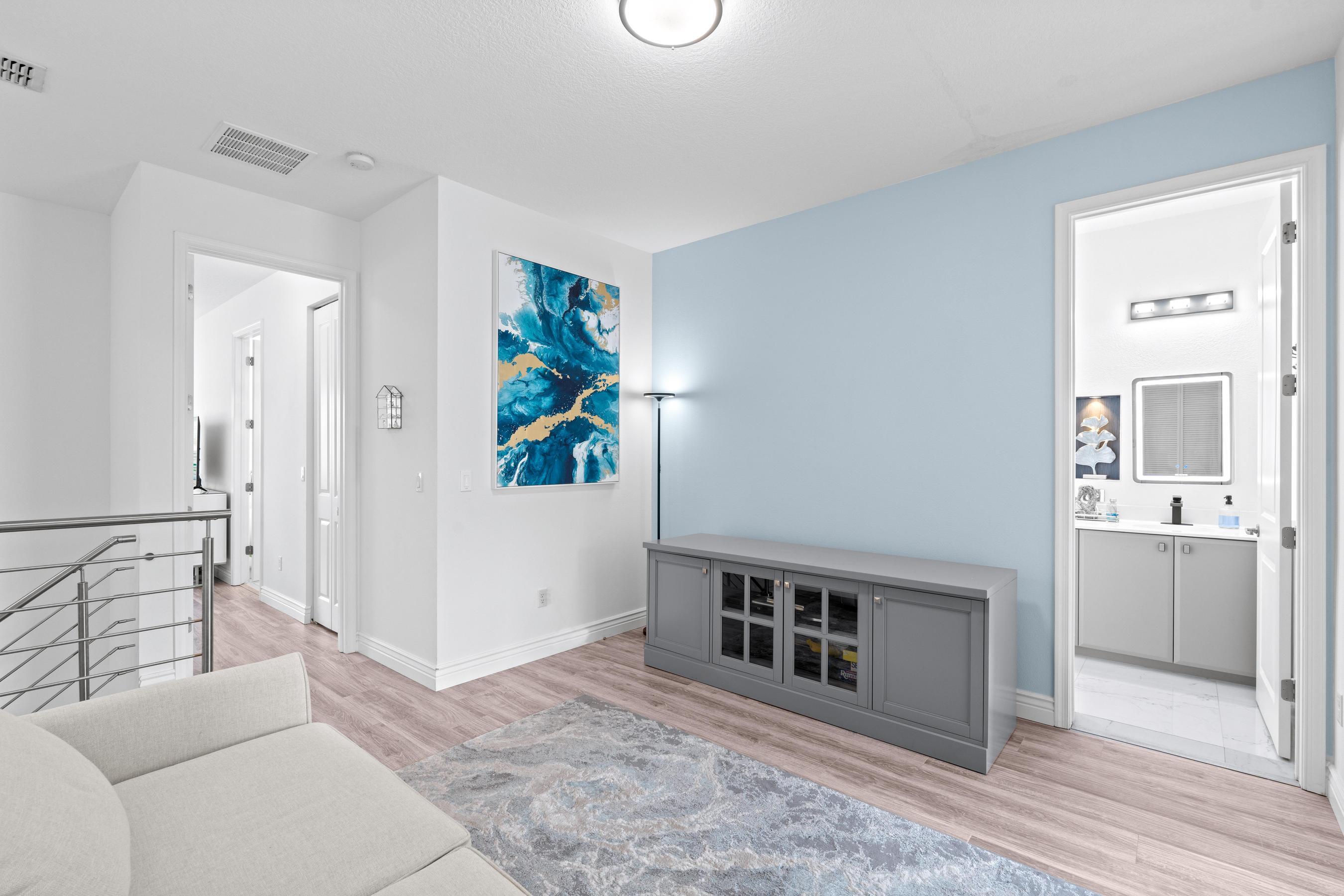 5010 Northwest 16th Way Boca Raton, FL 33431 - Photo 25 of 42 a view of a bedroom with wooden floor and windows