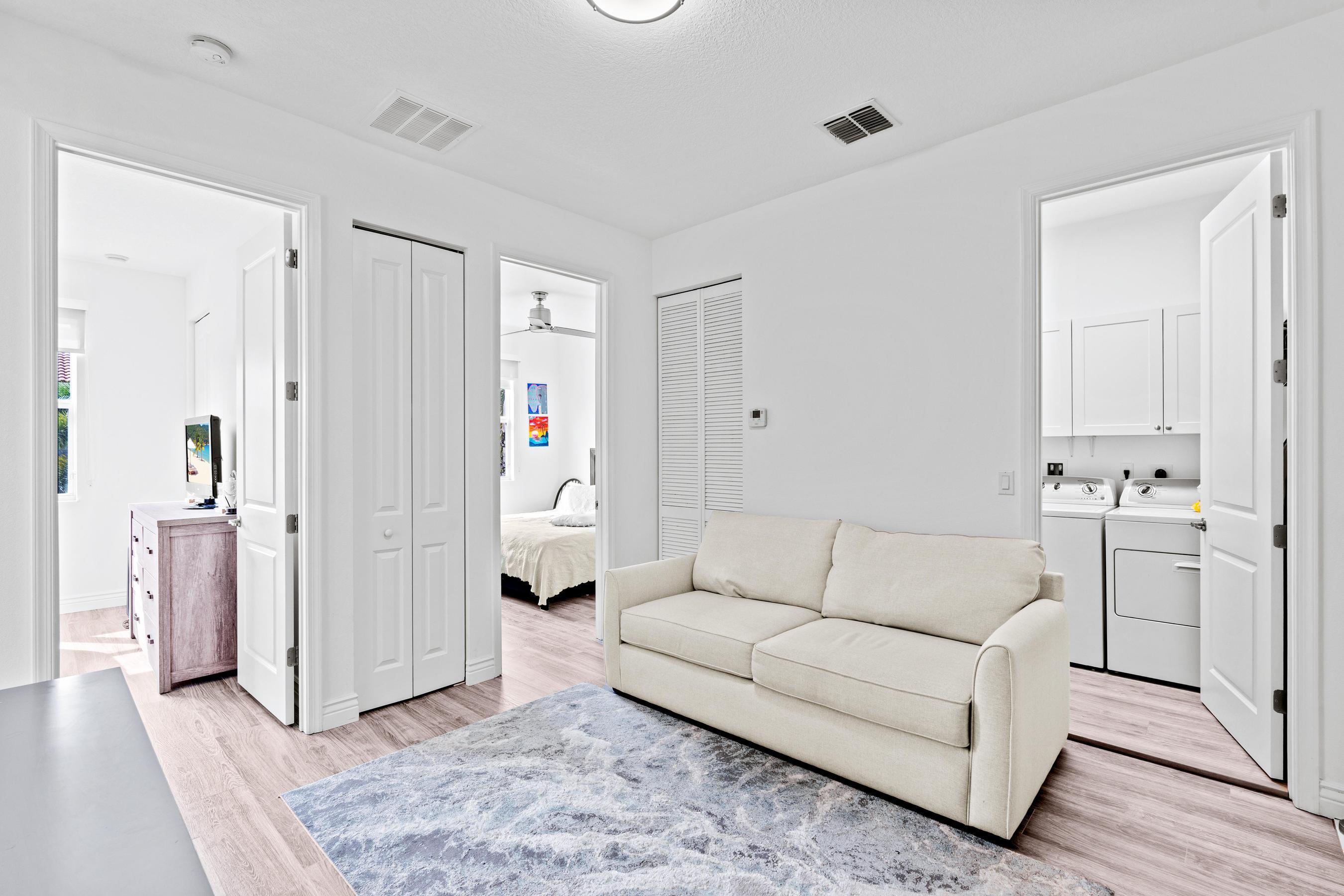 5010 Northwest 16th Way Boca Raton, FL 33431 - Photo 26 of 42 a living room with furniture and white walls