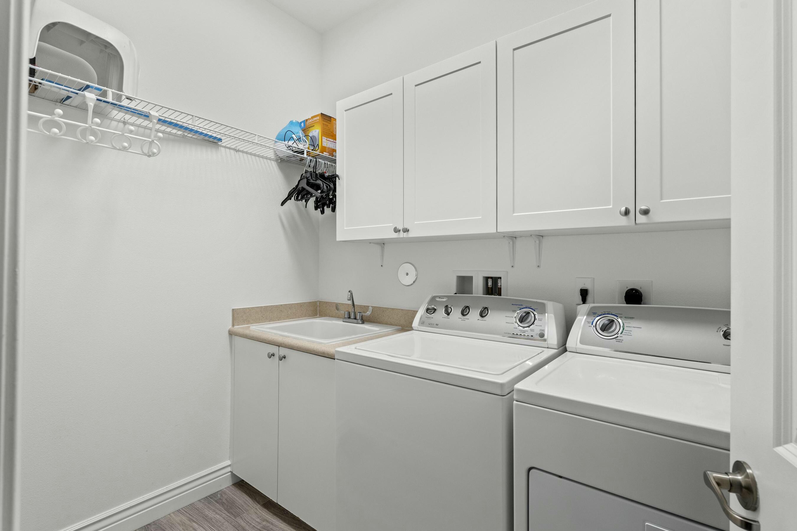 5010 Northwest 16th Way Boca Raton, FL 33431 - Photo 29 of 42 a utility room with dryer and washer