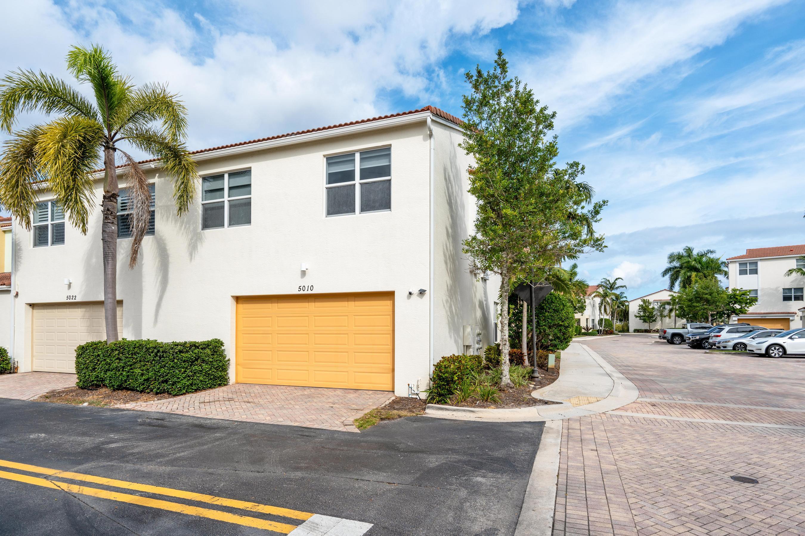 5010 Northwest 16th Way Boca Raton, FL 33431 - Photo 31 of 42 a view of a house with a street
